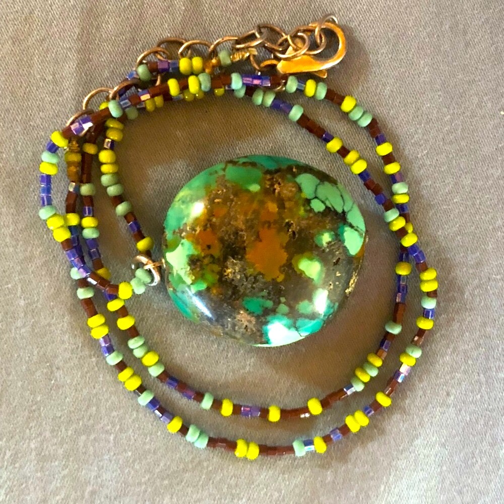 Beautiful turquoise necklace on glass beads